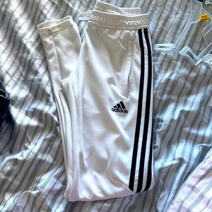 white adidas sweatpants, have a little spot on it that’s a little torn, xs